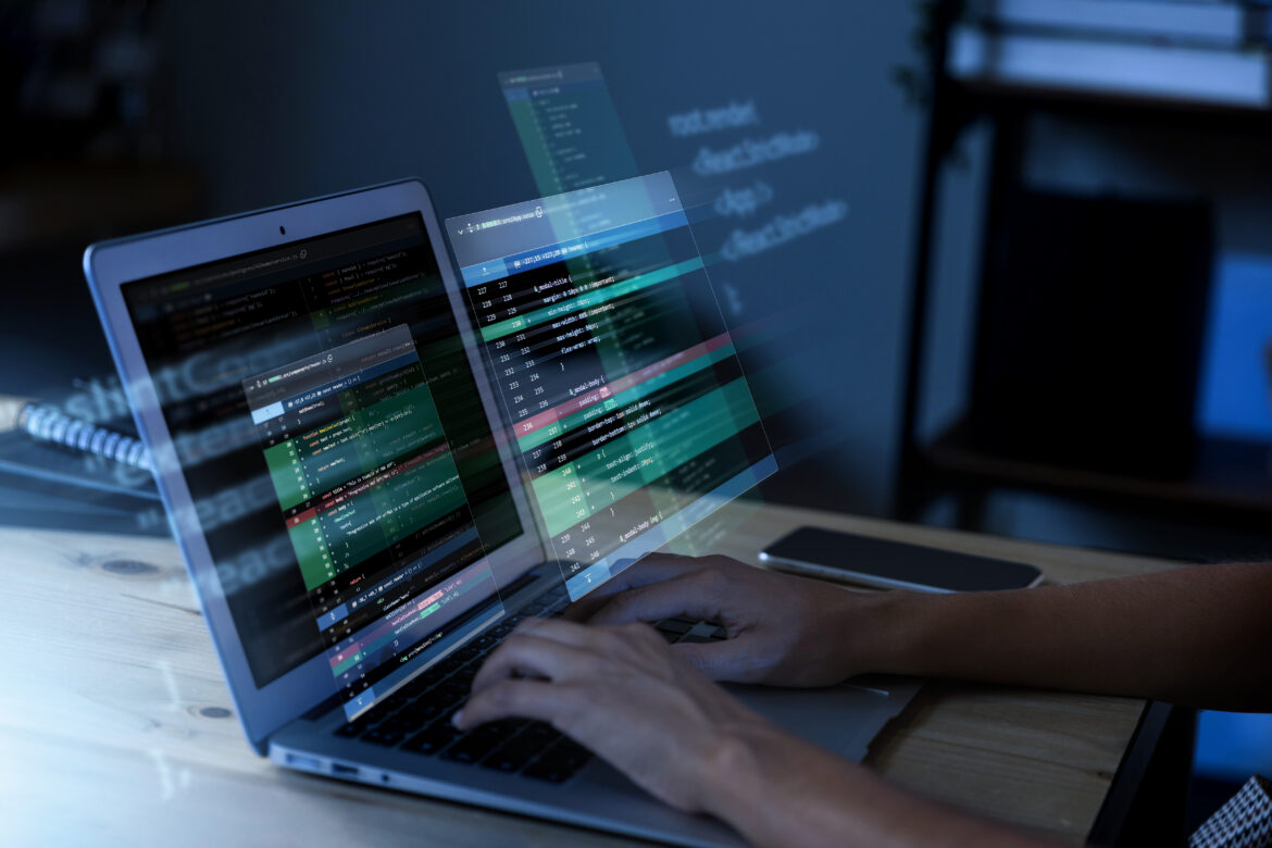 programming-background-with-person-working-with-codes-computer ciberseguridad NIS-2